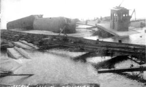 G-17713FF3.1-14 Wrecked cars on causeway storm of Aug 16/15