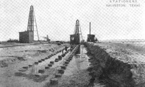 G-5925.1FF1-1 THE GALVESTON SEAWALL."  "LAYING THE FOUNDATION - 3 ROWS OF 50 FT. PILING, AND 1 ROW SHEET PILING.