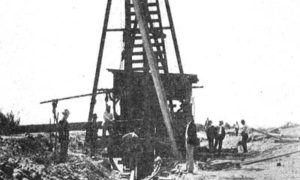 G-5925.1FF1-7 GALVESTON SEAWALL.  PILE DRIVER AT WORK.