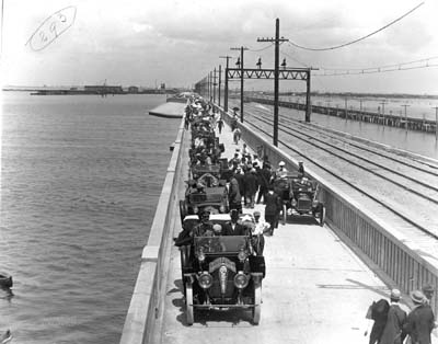 Photograph labeled Auto traffic on old bridge