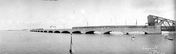 Photograph of passenger train crossing causeway into Galveston