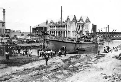 Grade Raising, Photograph of Holm dredging canal near Negro Hospital and Nurses' Home