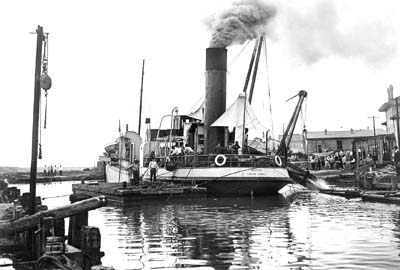 Grade Raising, Photograph labeled Pontoon Pipe Line, Dredge Sealy