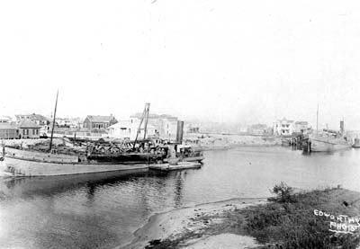 Grade Raising, Photograph of dredge Holm and another dredge discharging fill