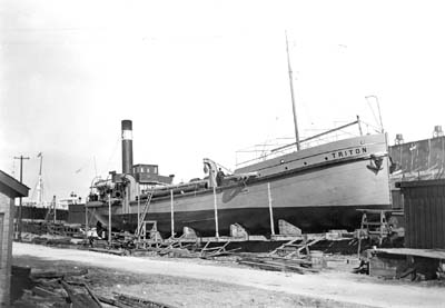 Grade Raising, Photograph of dredge 'Triton' in dry dock 