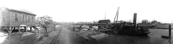 Grade Raising, Photograph labeled Dredge 'Triton,' discharging 