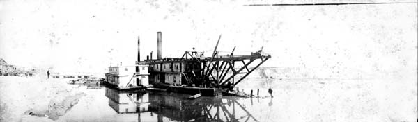 Grade Raising, Photograph labeled Dredge 'George Sealy' dredging turning basin