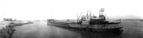Grade Raising, Photograph labeled Dredge 'Galveston' in canal 