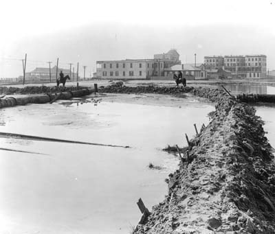 Grade Raising, Photograph of area behind Seawall Boulevard being filled 