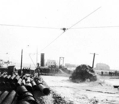 Grade Raising, Photograph of dredge discharging fill 