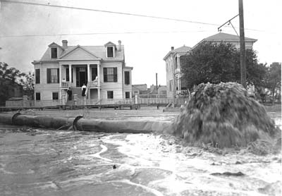 Photograph labeled Discharging Filling through Pipeline