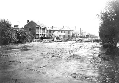 Photograph of pumping of fill along residential street 