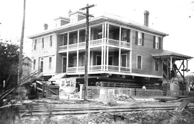 Photograph labeled This house is on the SW corner of 33rd & Broadway 