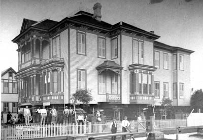 Photograph of Harry Langben residence being raised 