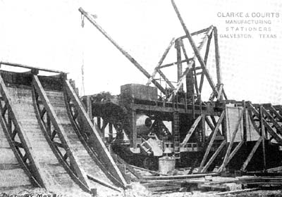 Photograph labeled The Galveston Seawall. The Big Mixer 