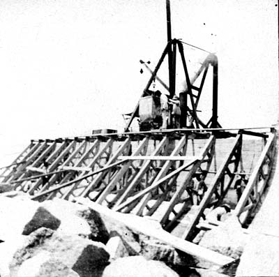 Seawall, Photograph labeled Filling the cement boxing 