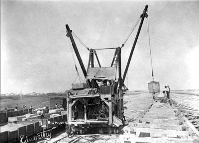Photograph labeled Big Mixer at Work 