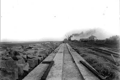 Photograph labeled Section of Seawall now known at University Blvd (6th St.) 