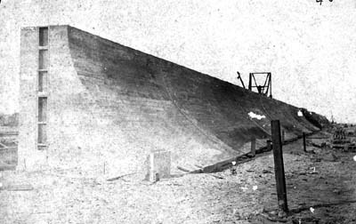 Photograph labeled A solid block of finished wall 