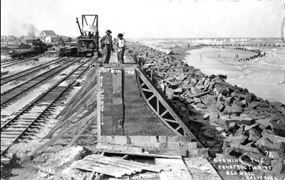 Photograph labeled Showing the Construction of the Seawall 