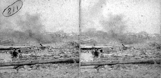 Stereo card labeled burning bodies on the beach