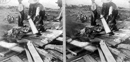 Stereo card labeled Cremating the Dead