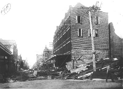 Photograph looking down Avenue E. Grant Hotel on right, Galveston, Texas