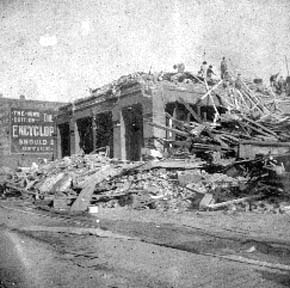 Photograph of ruins of commercial building