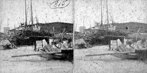 Stereo card labeled Tremont and wharf