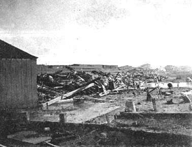Photograph labeled Wharf scene near Elevator B