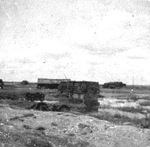 Photograph labeled Over turned Cars near the Bay Bridge