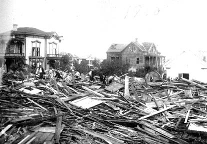 Photograph labeled Looking for the dead. Ave. P & Tremont looking north