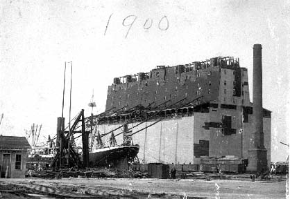 Photograph of Steamship moored at wharf