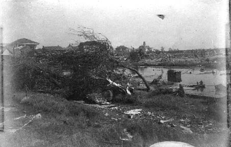 Photograph labeled Looking east from 12th Ave. L