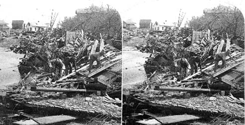 Stereo card labeled Recovering bodies from that awful chaos