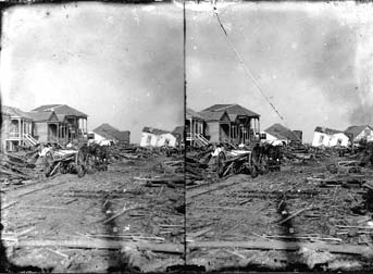 Stereo glass negative of residential devastation