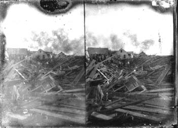 Stereo glass negative of ruins of residential area