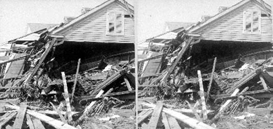 Stereo card of collapsed house and debris