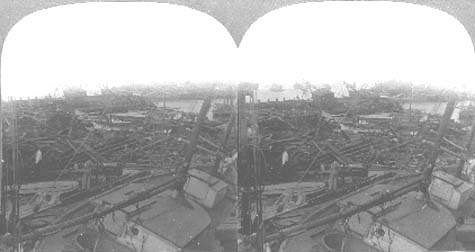 Stereo card labeled Stranded Vessels at the Wharf