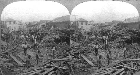 Stereo card labeled Searching for the Dead among the Ruins 