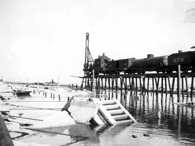 Photograph labeled Building a trestle