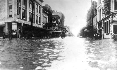 Photograph labeled Market St looking North at 4 PM. on Aug 16th prior to the Gulf coming over