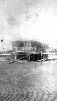 Photograph of wrecked house on Seawall Boulevard 