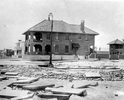 Photograph of wrecked apartment building on Seawall Boulevard 
