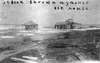 Photograph labeled Saloon thrown against the house