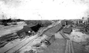 G-1771FF9.1-12 Wrecked and overturned freight cars in freight yard