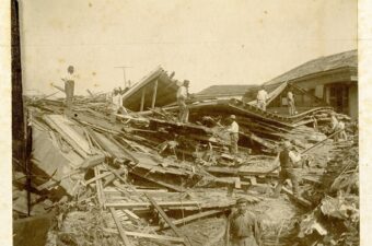 Photo of men searching through debris after the Storm of 1900 in Galveston, Texas. StoryMap Exhibit of 1900 Storm Damage