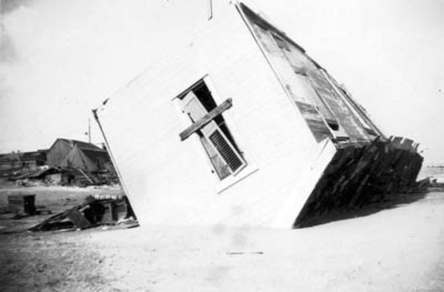 G-17713FF9.1-2 House turned over on its roof.