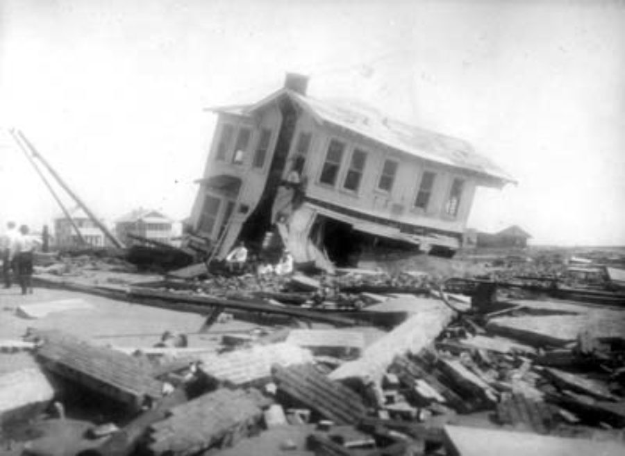 G-17713FF9.4-2 Wrecked house and debris along Seawall Boulevard