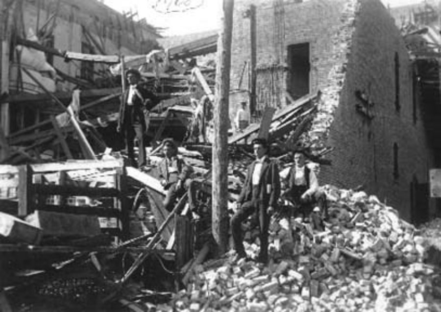 G-1771FF6.1-9 Group of men posed at ruins of Grand Opera House